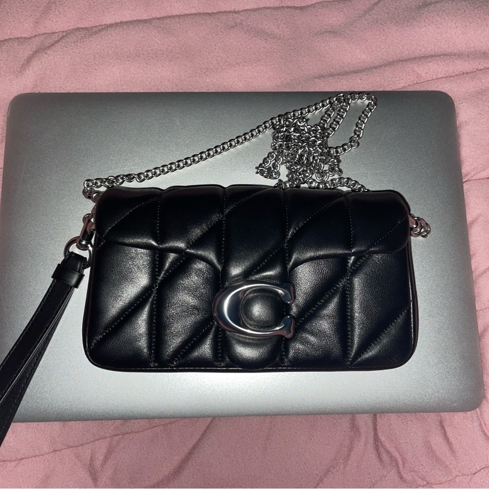Tabby Crossbody Wristlet With Pillow Quilting. Black with silver hardware.